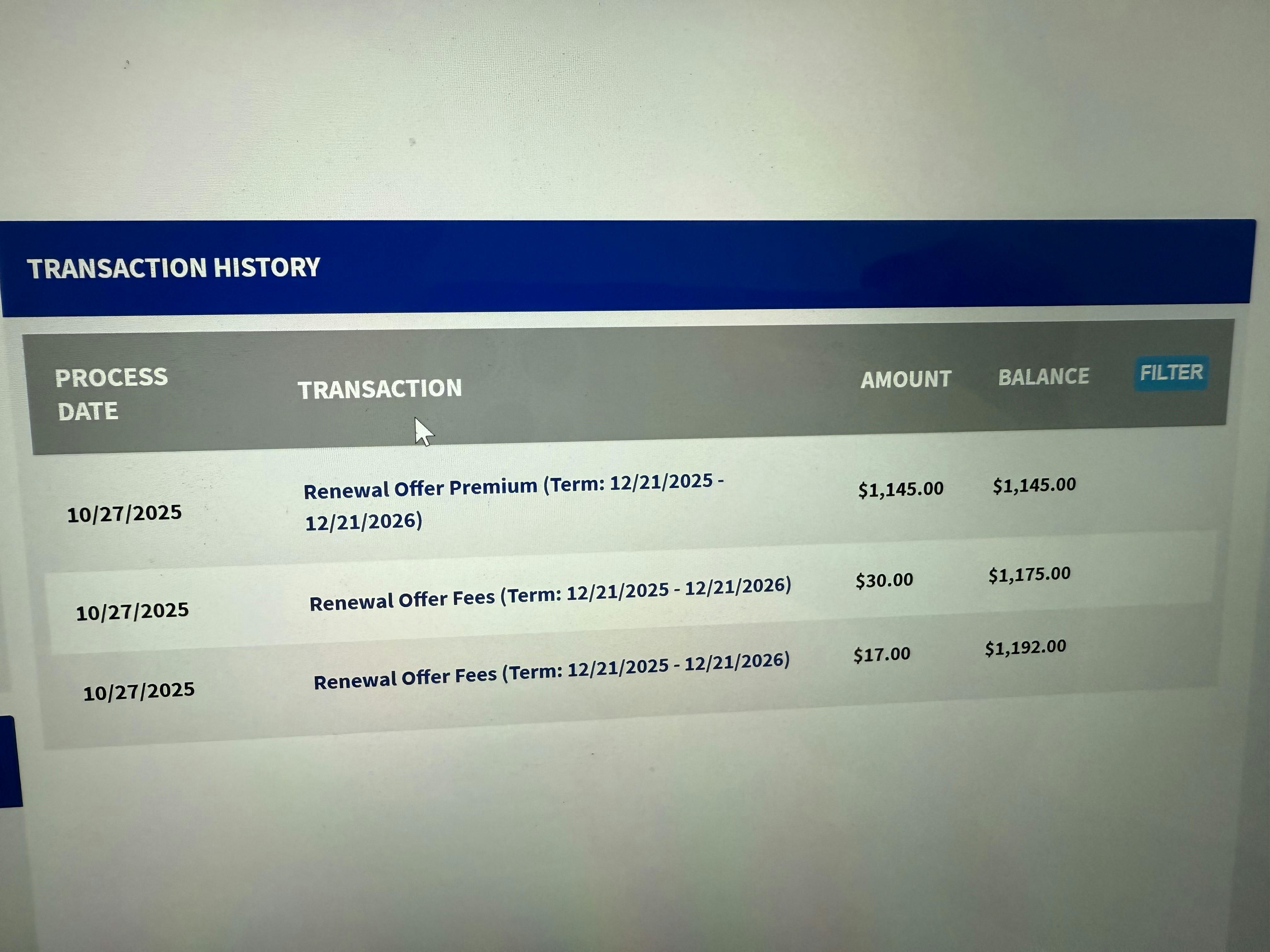 Digital transaction history table showing insurance renewal fees and premiums