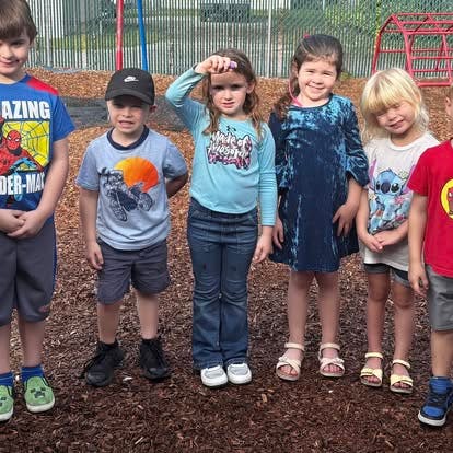 Group of children standing outdoors