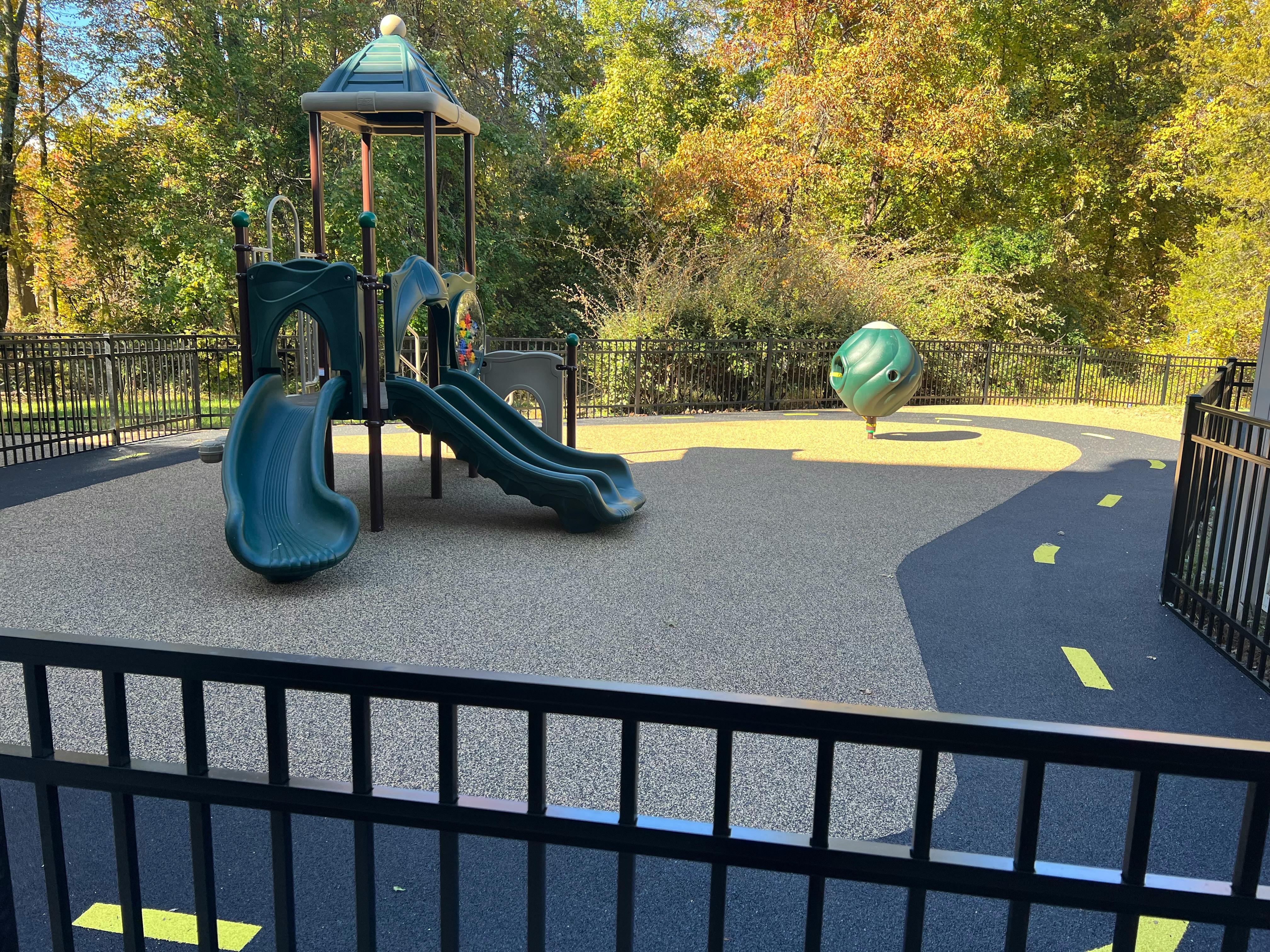 Playground with slides and climbing structure