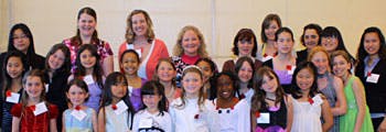 Group of adults and children posing