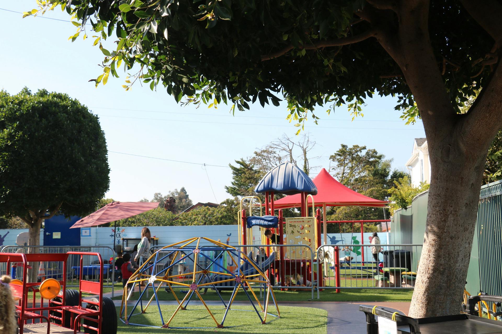Playground with climbing dome and play structure