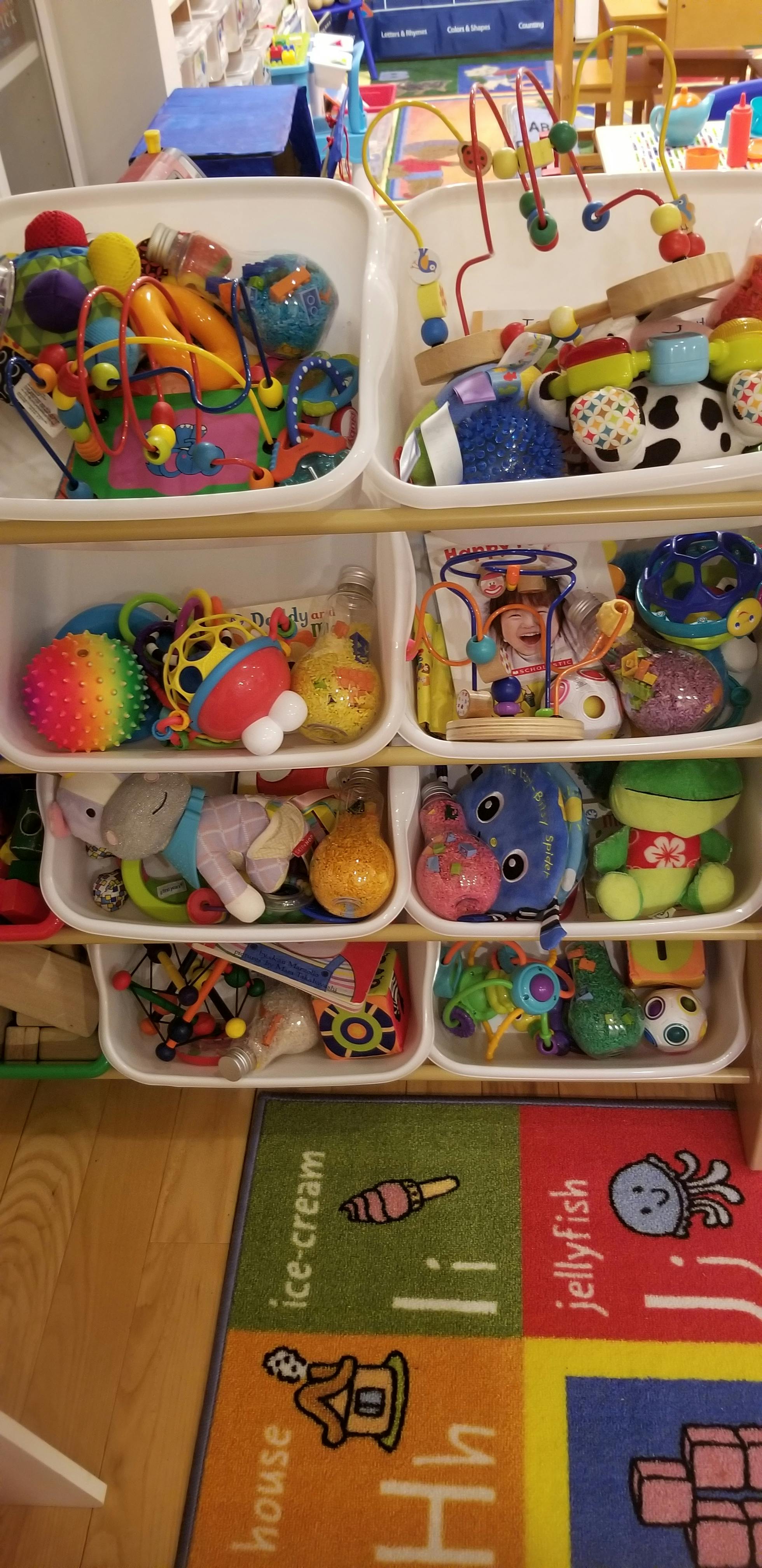 Shelves filled with various colorful toys and stuffed animals