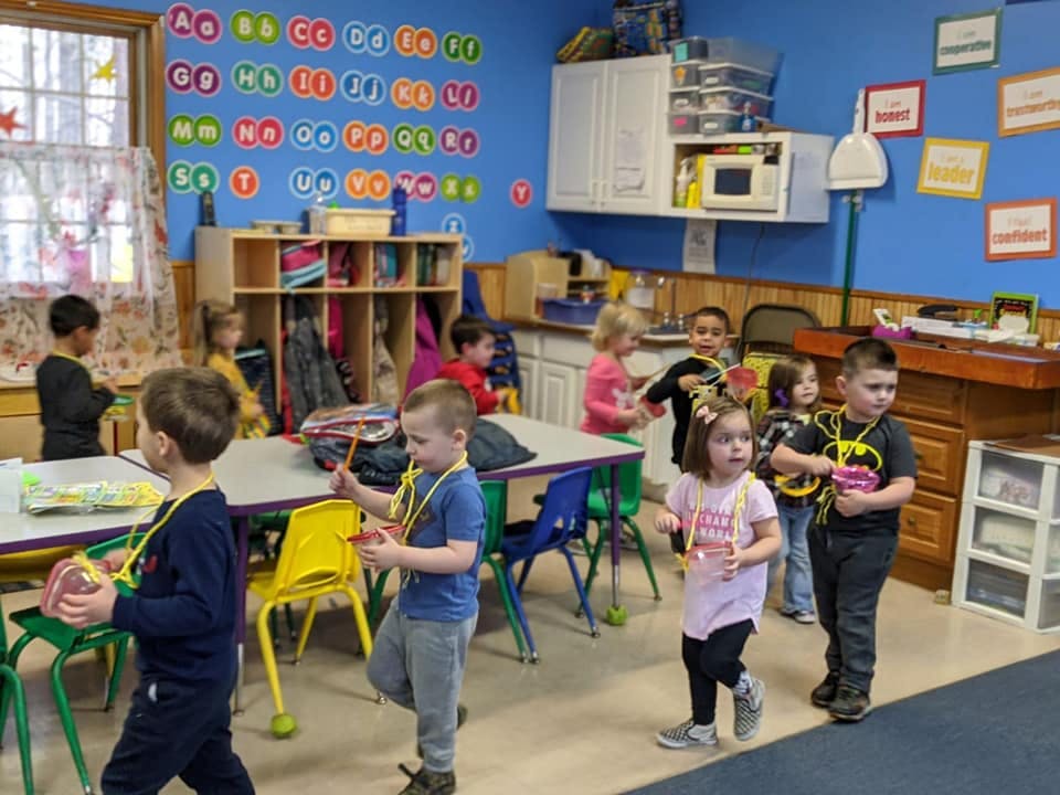 Children playing in a classroom
