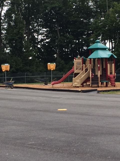 Playground with slides and climbing structures