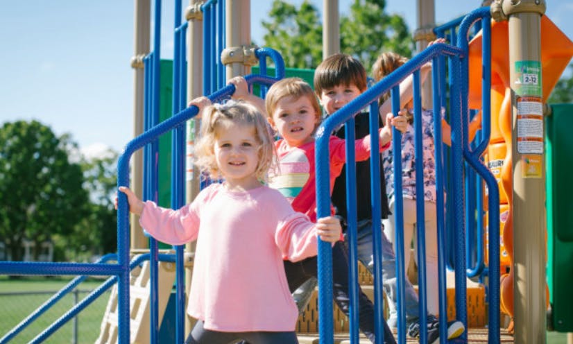 Children on a playground structure