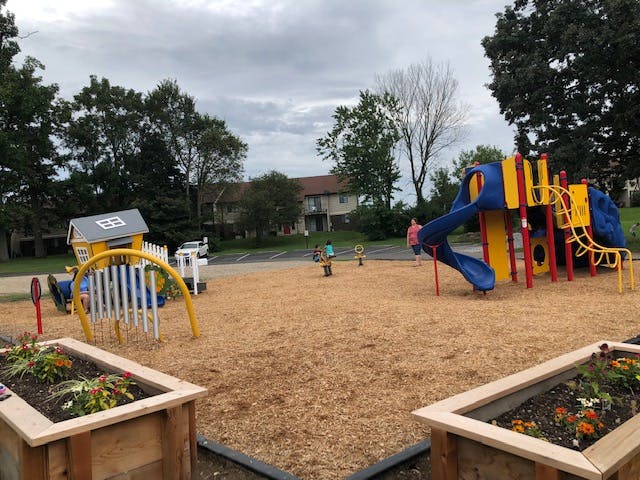 Playground with play structures and wood chips