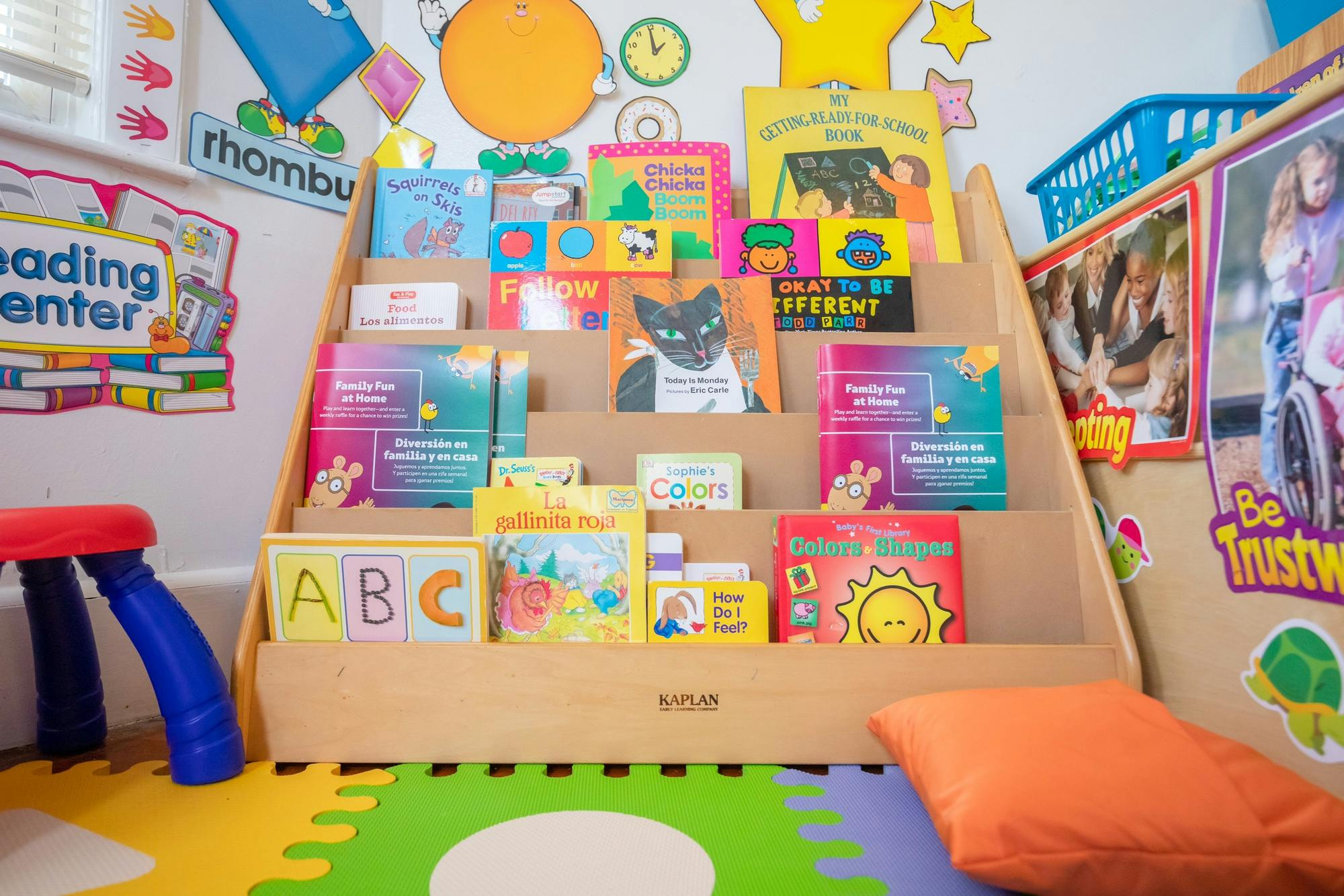 Books displayed in a wooden book holder