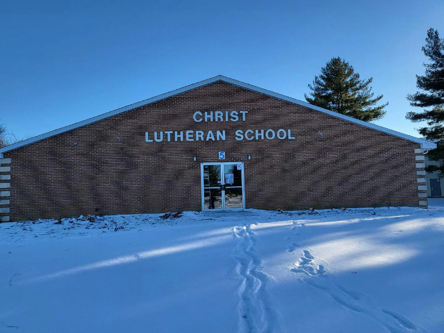 Christ Lutheran School building with snow on the ground