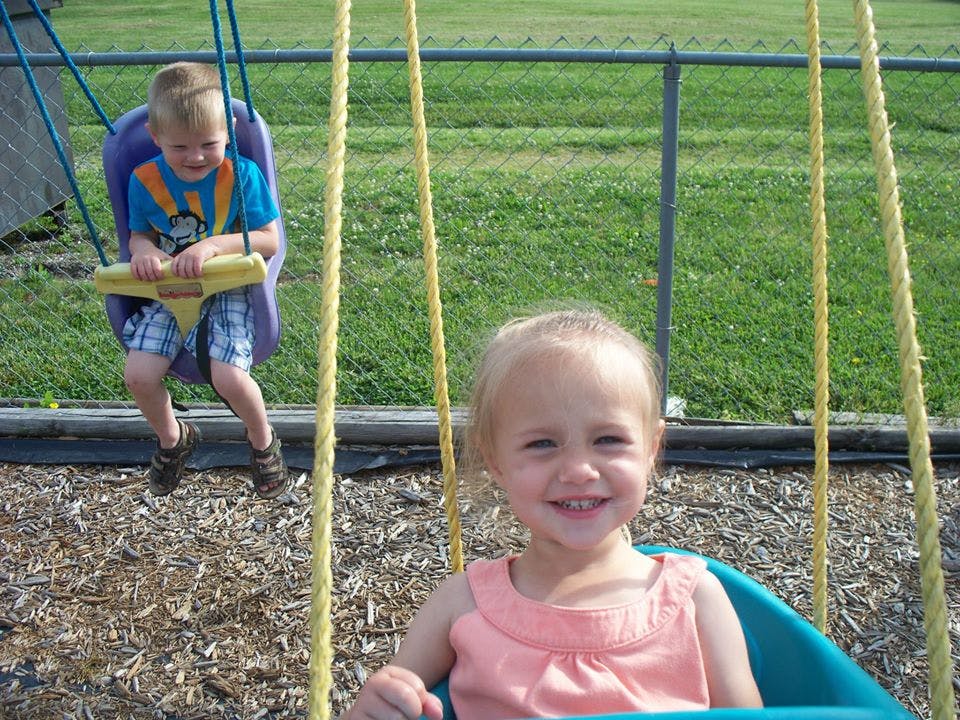 Two children on swings