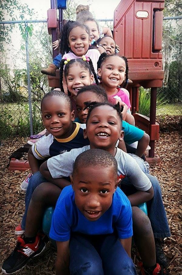 Group of children on playground equipment