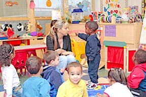 Adult and children in a classroom