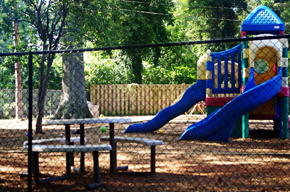 Playground with slides and a picnic table