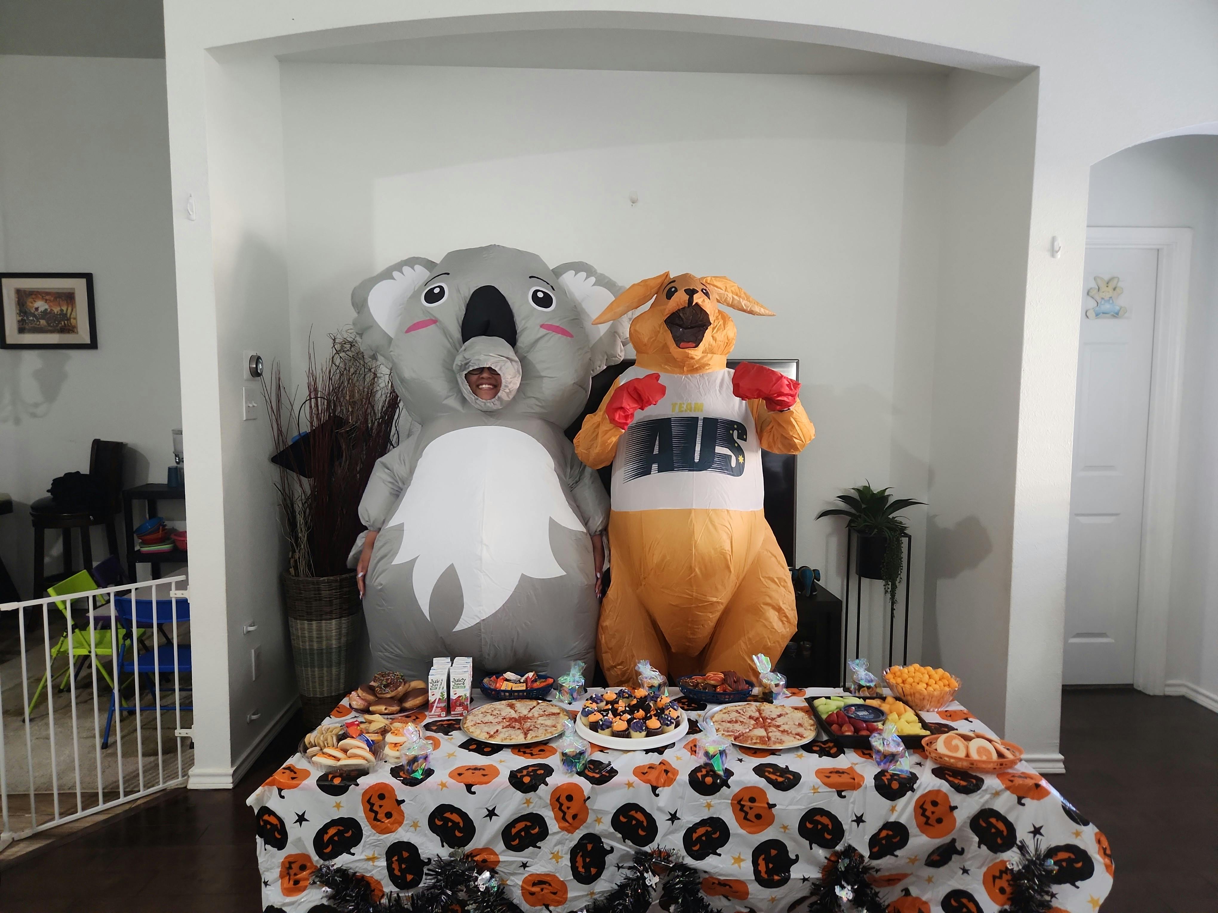 Inflatable koala and kangaroo with a table of food