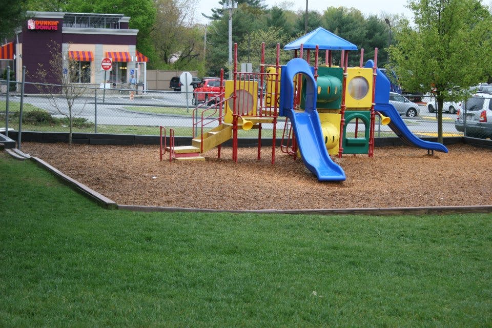 Playground with slides and climbing structures