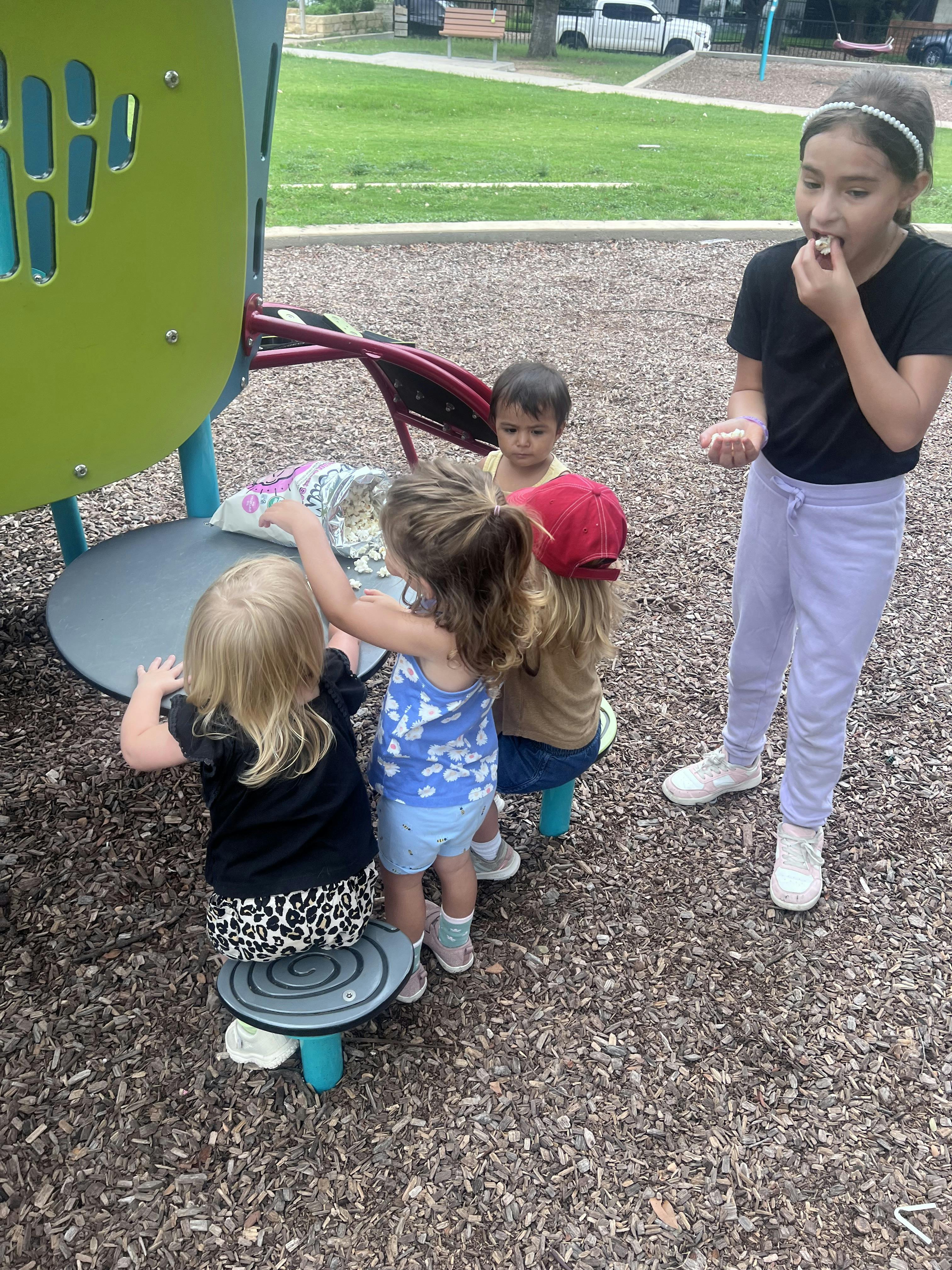 Children playing on playground equipment