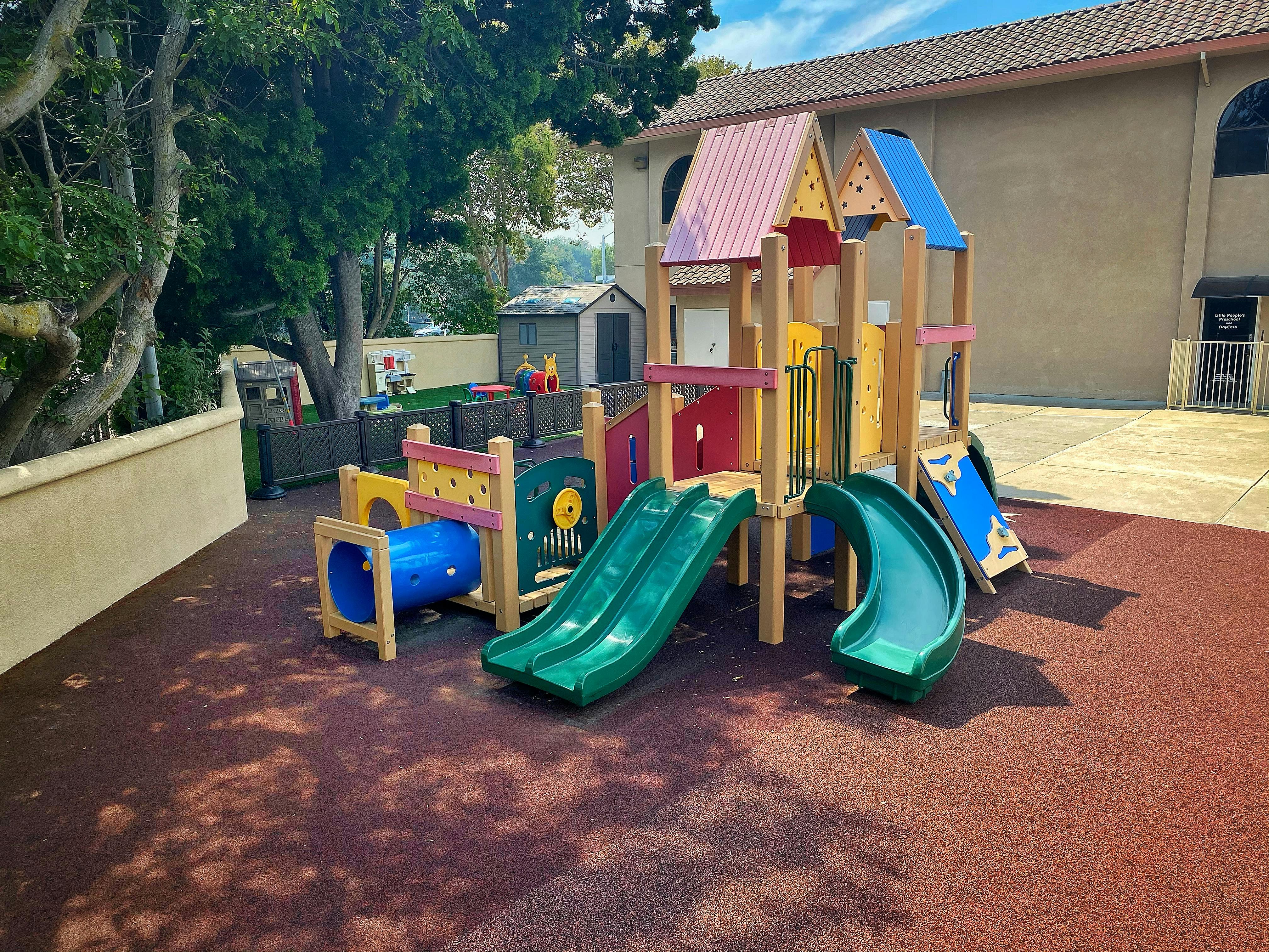 Playground with slides and tunnels on a soft ground surface