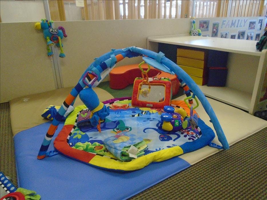 Baby activity gym with play mat and toys