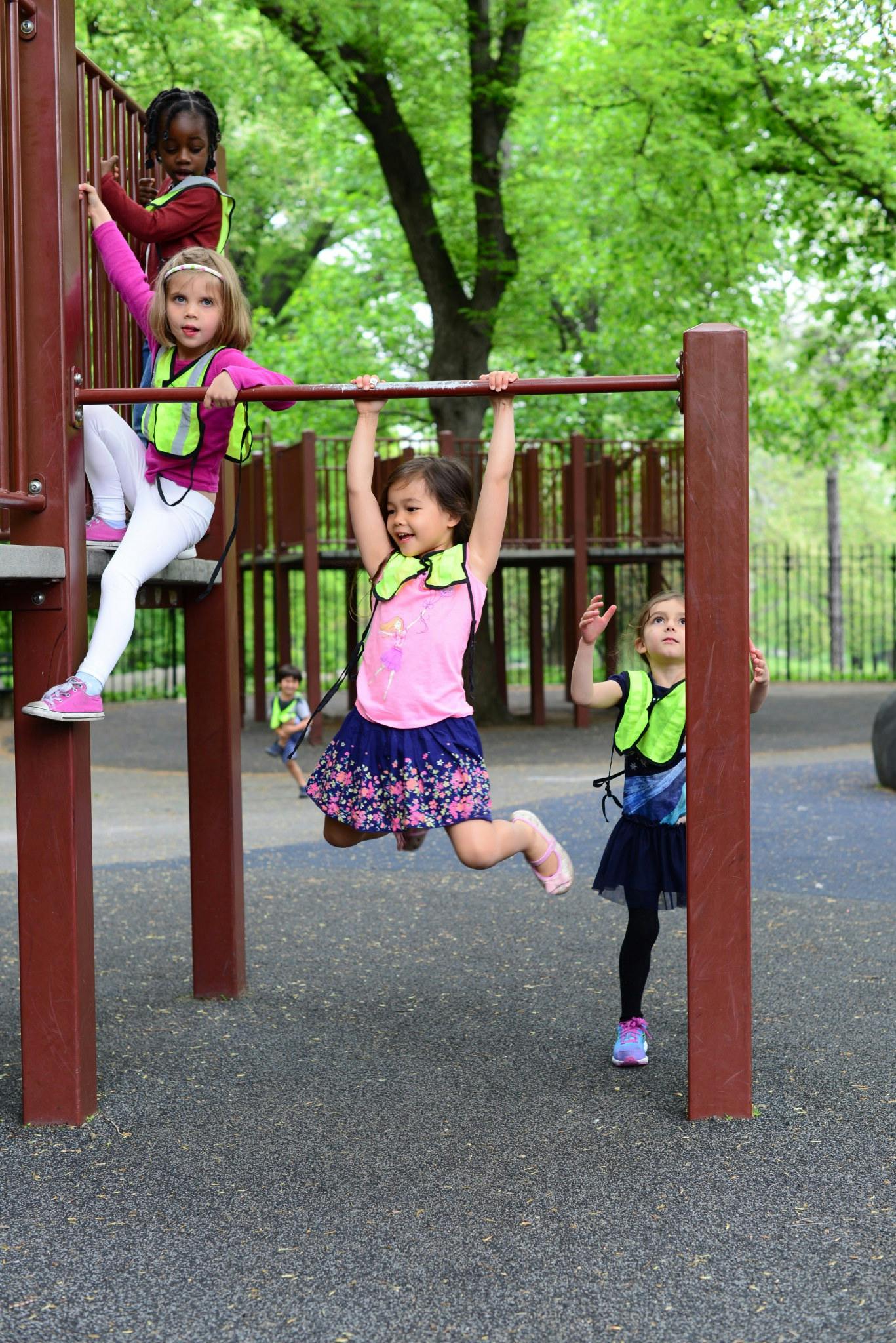 Children playing on playground equipment