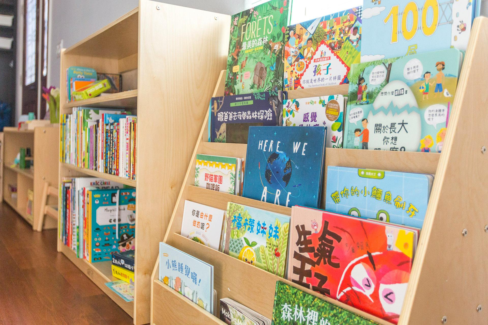Books displayed on shelves and in a tiered book stand