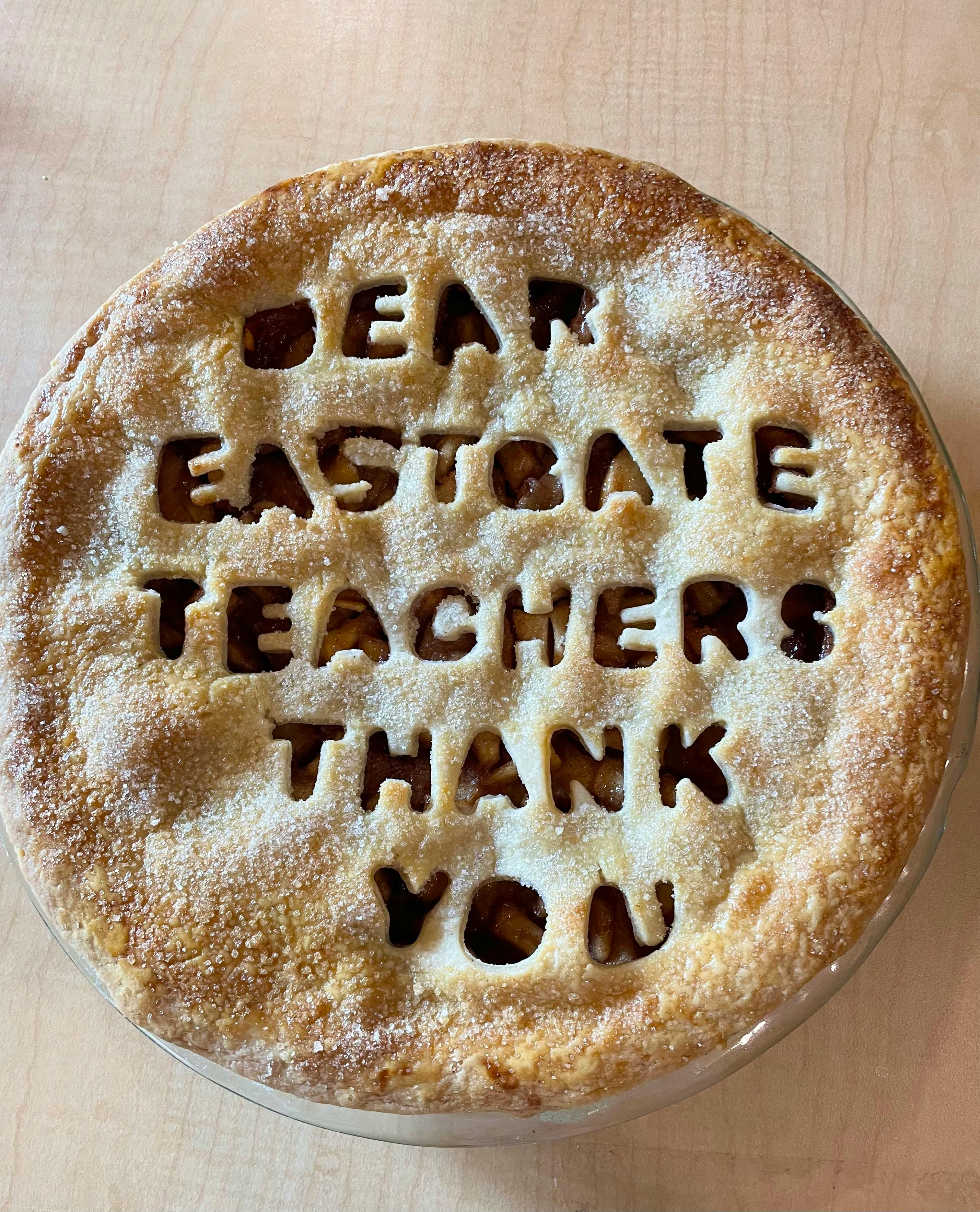 Pie with "Dear Eastgate Teachers Thank You" cut into the crust