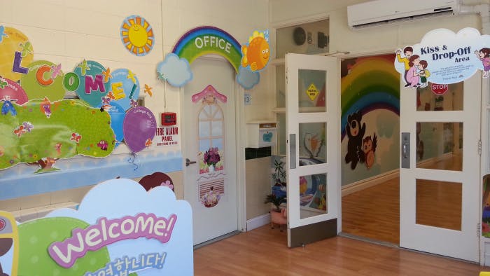 Decorated room with a welcome sign and office door
