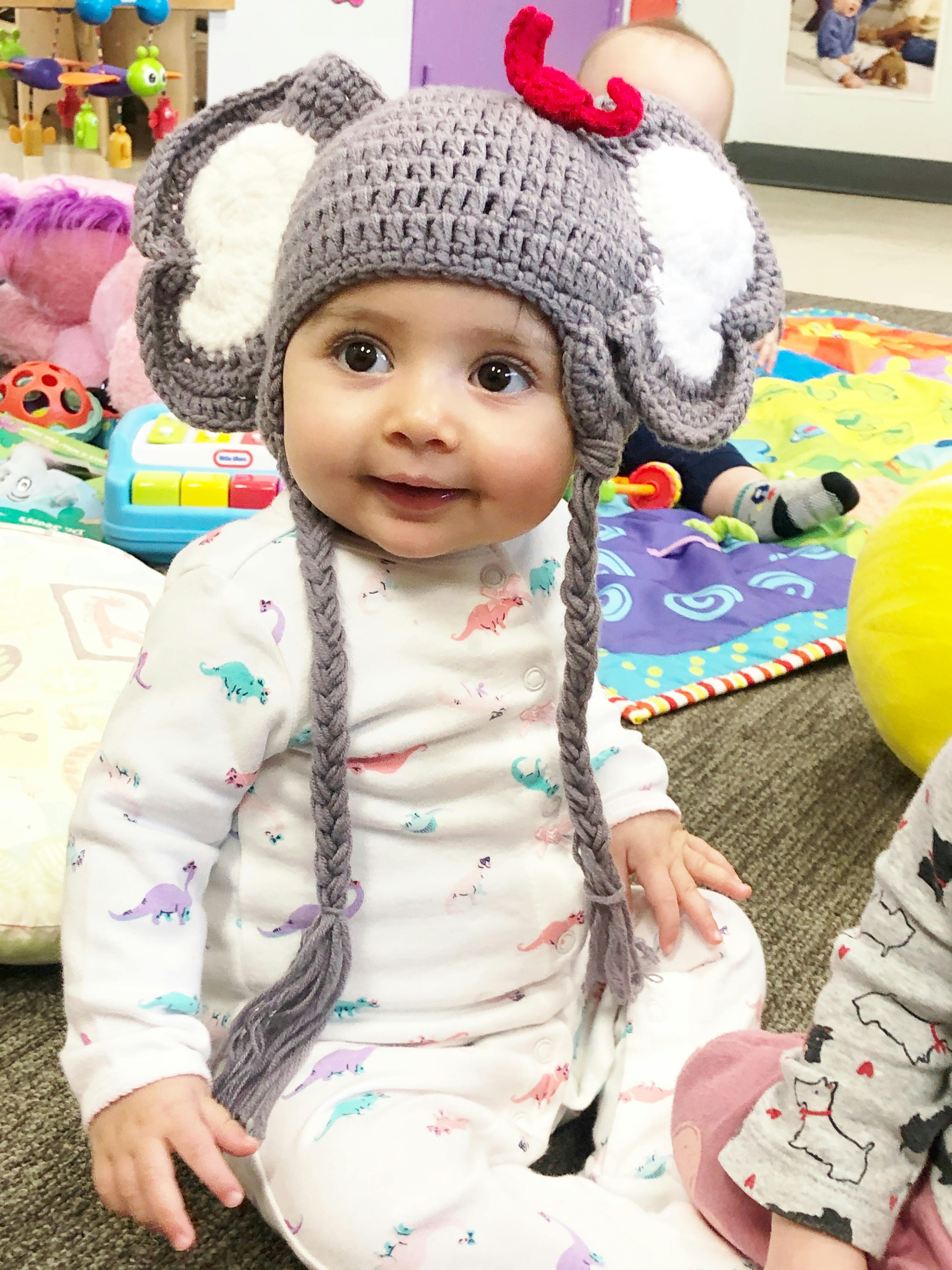 Child in an elephant hat