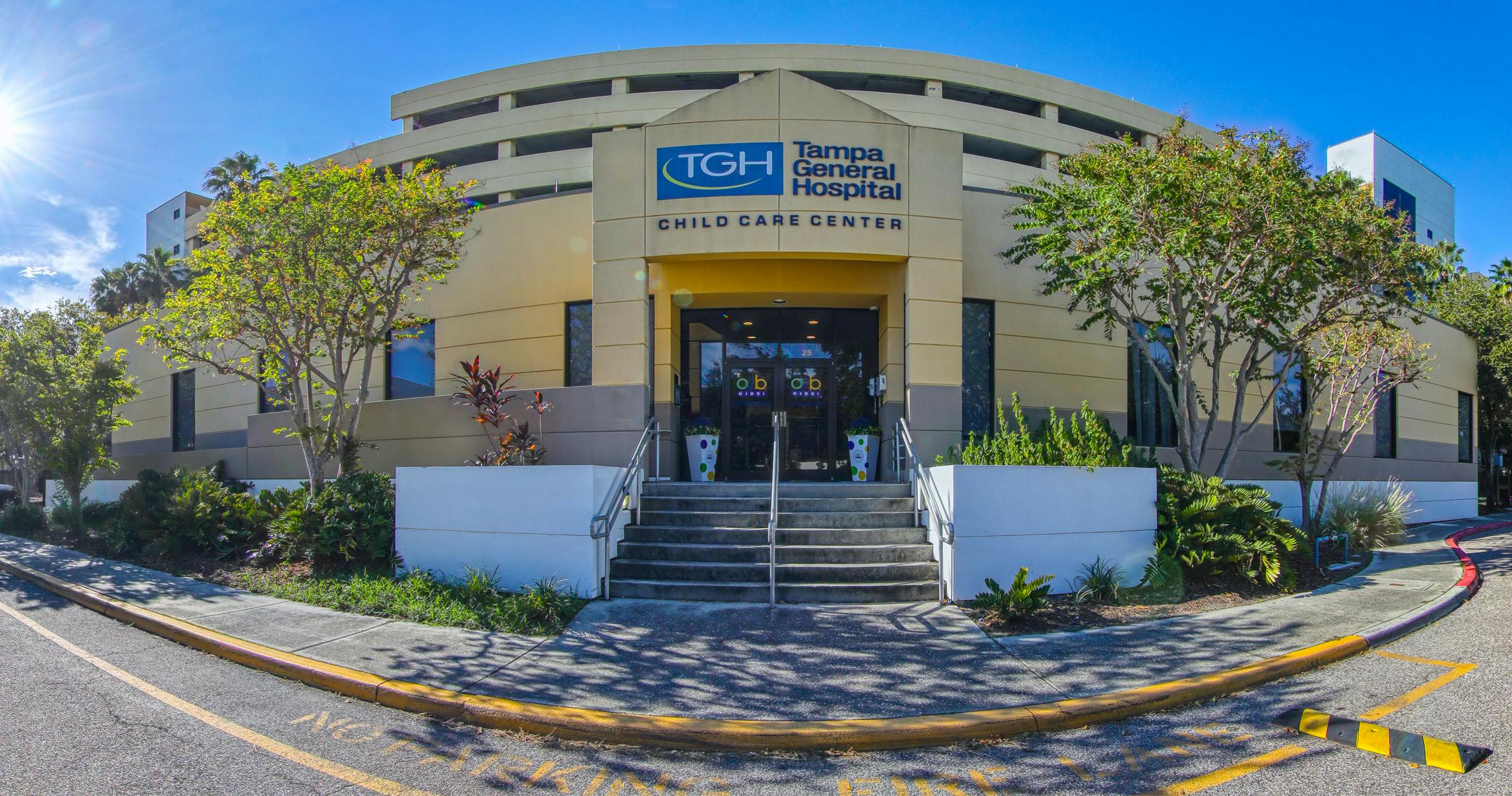 Entrance to Tampa General Hospital Child Care Center with stairs and landscaping