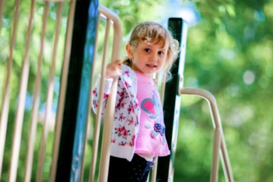 Child on a playground structure