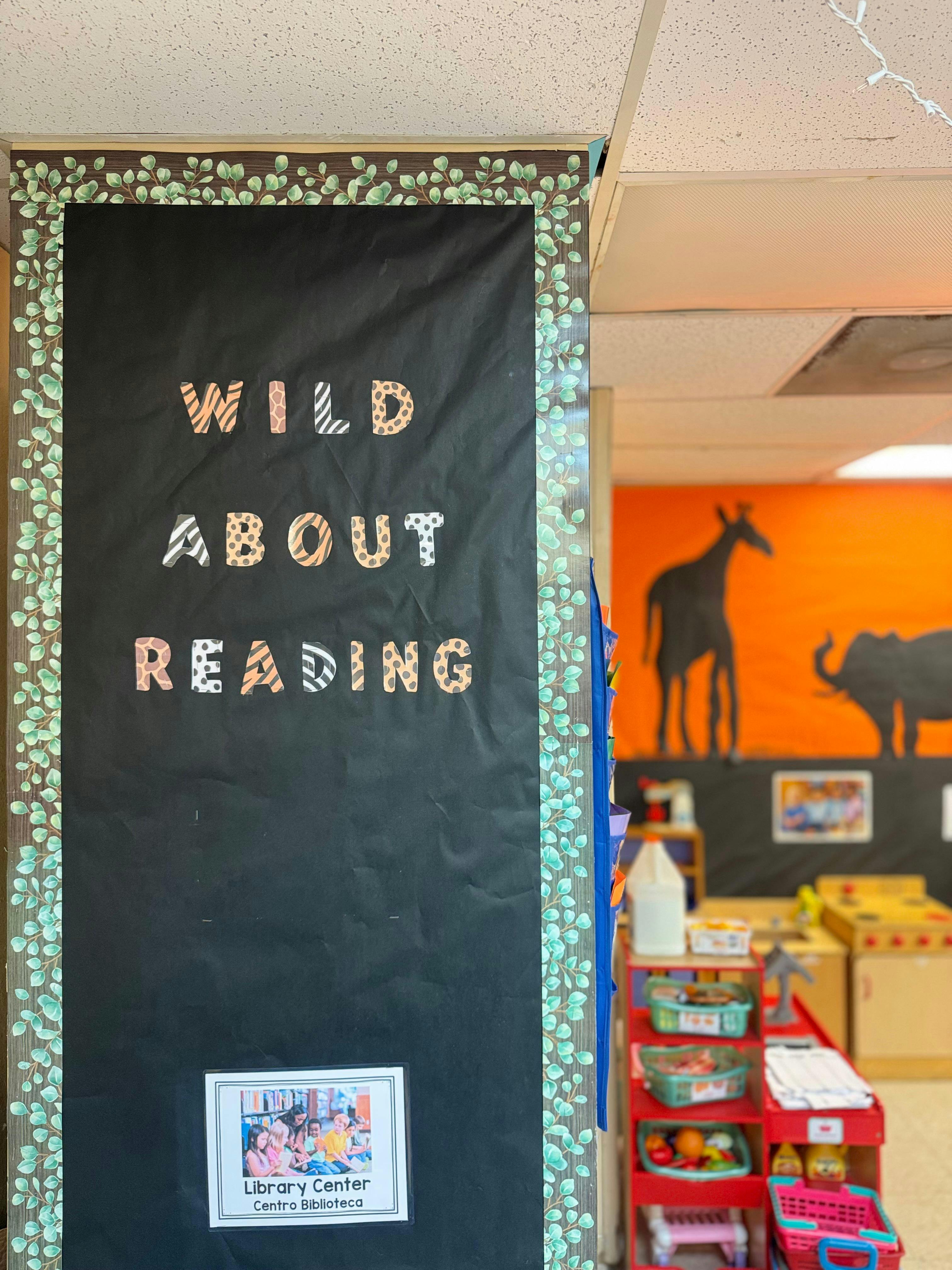 Classroom bulletin board with the text Wild About Reading