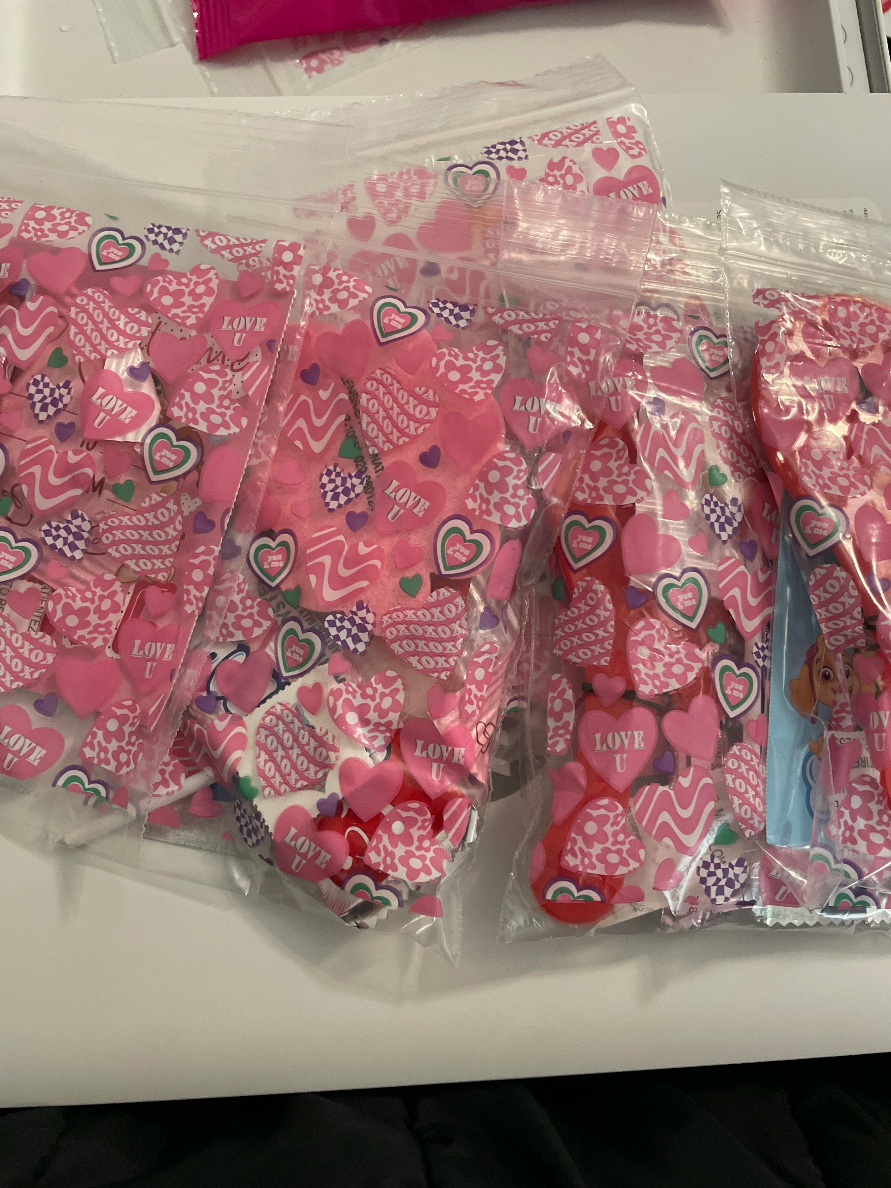 Bags of pink heart-shaped candies