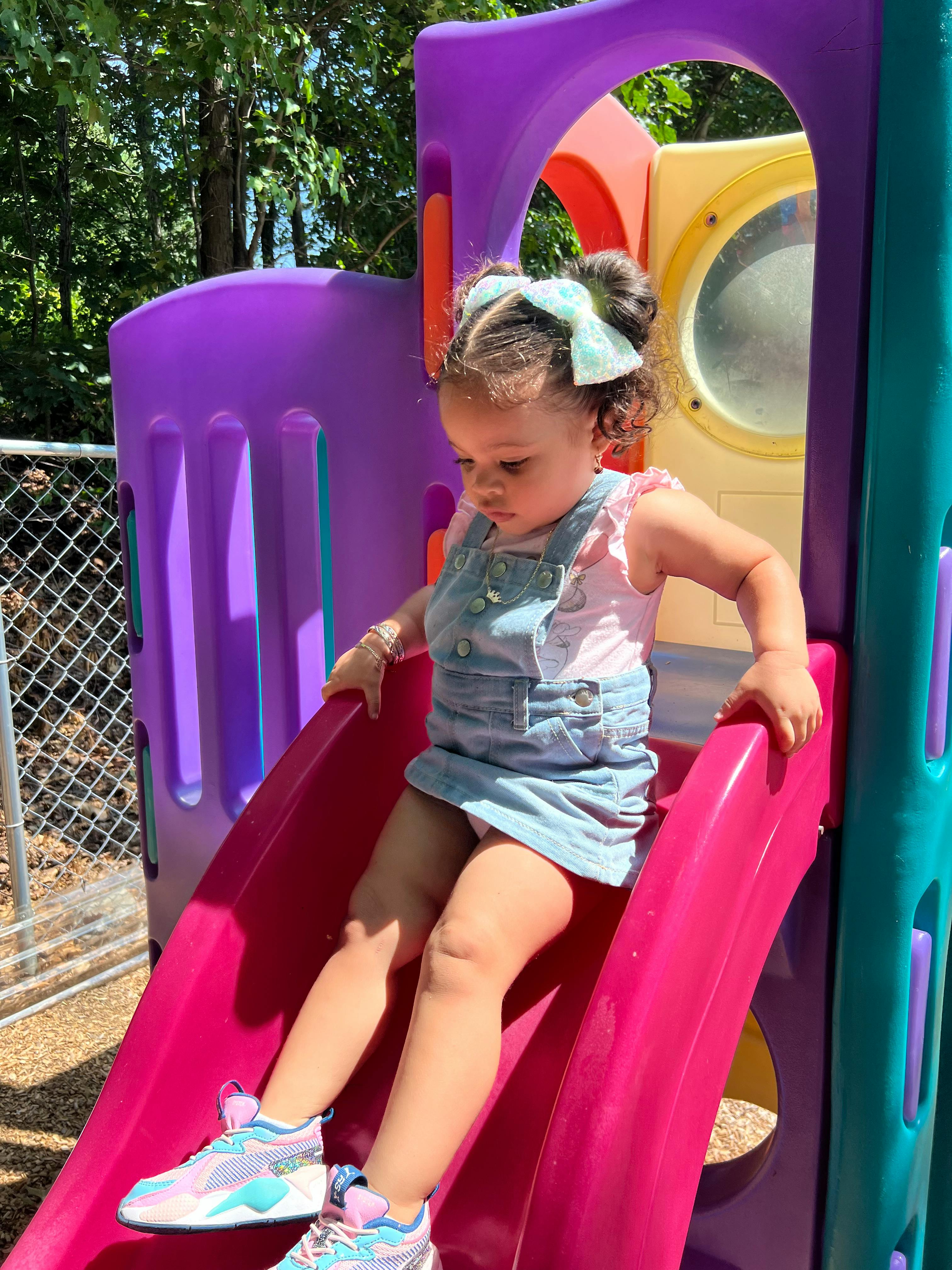 Child on a playground slide