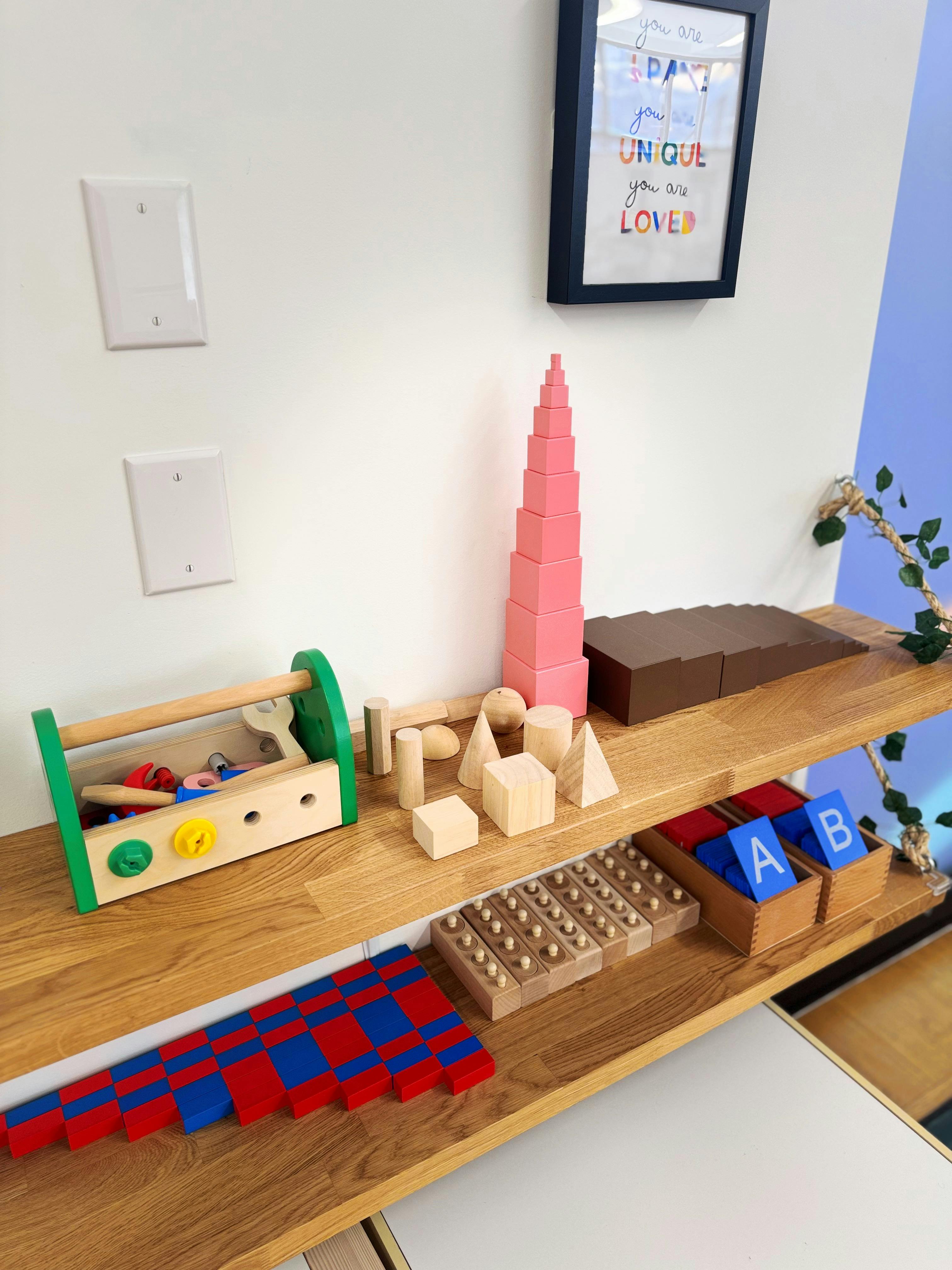 Montessori classroom shelves with various learning materials