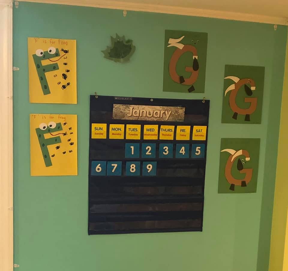 Classroom wall with a January calendar and letter F and G decorations