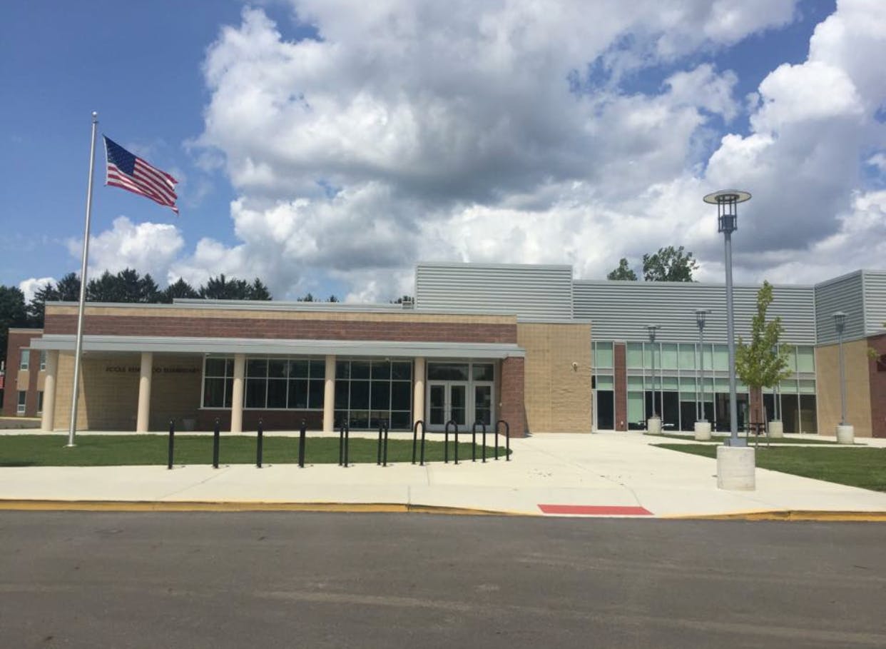 Building exterior with an American flag on a flagpole