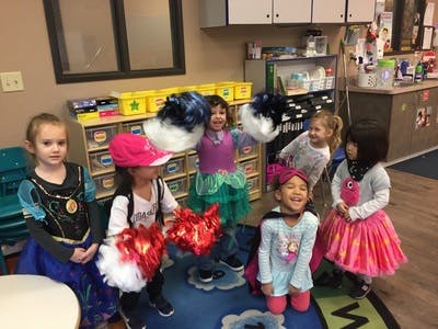 Six children in costumes