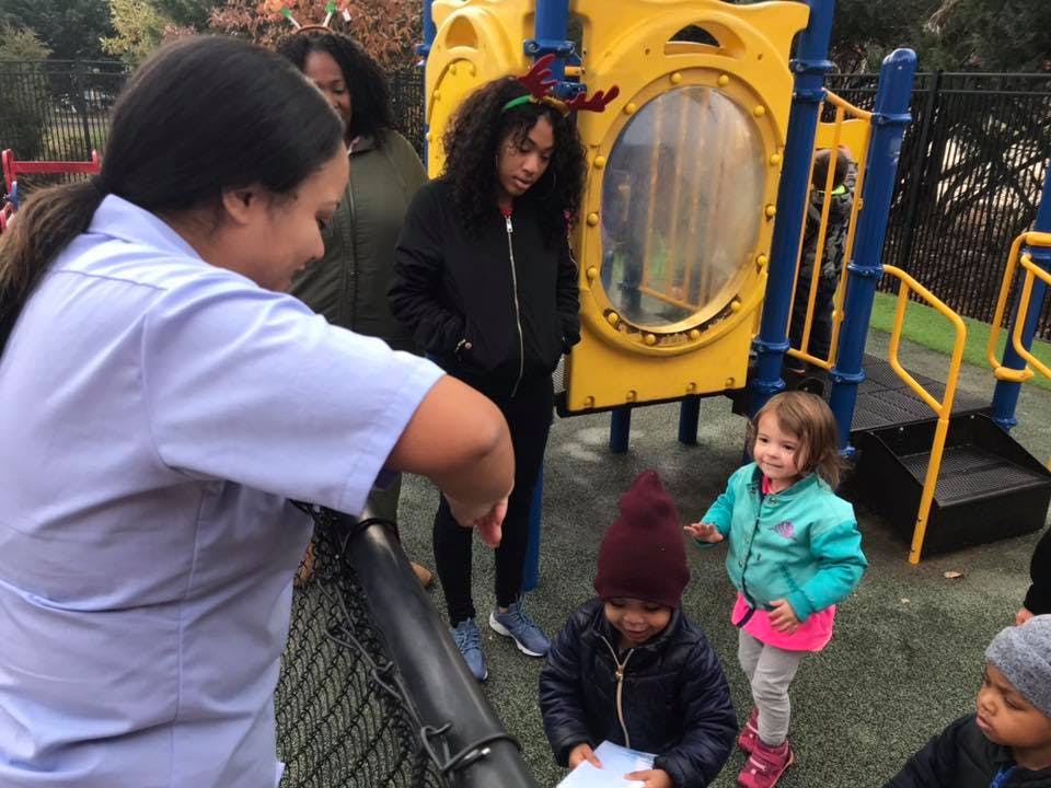 People and children on a playground