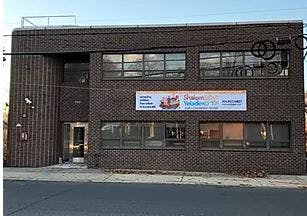 Brick building with a banner on the front