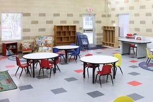 Classroom with small tables and chairs