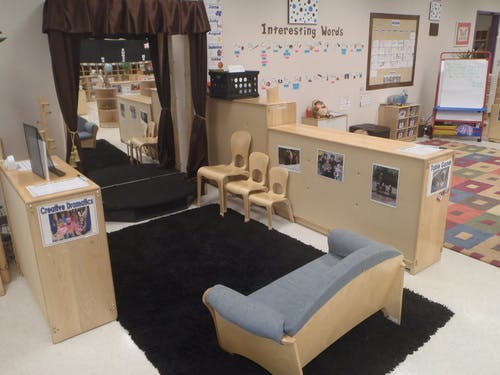 Classroom with a small stage area and seating