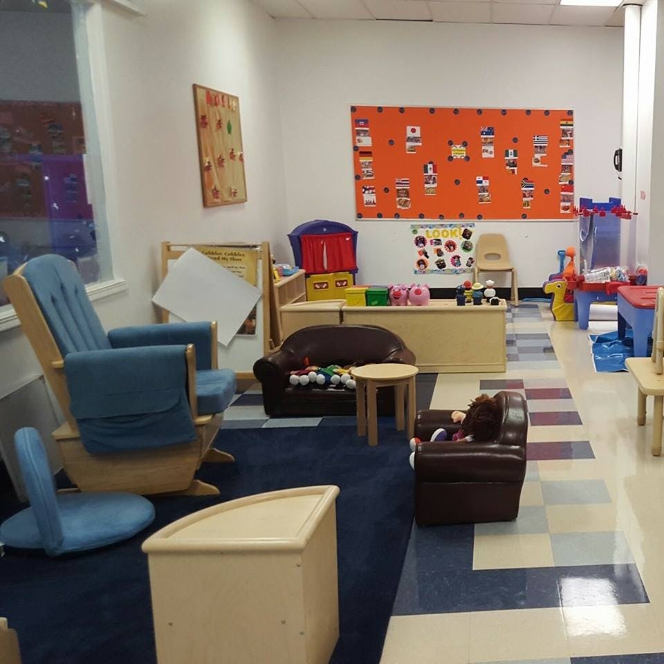 Children's play area with small furniture and toys