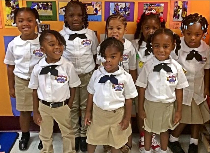Group of children in school uniforms
