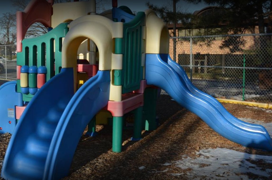 Playground structure with multiple slides