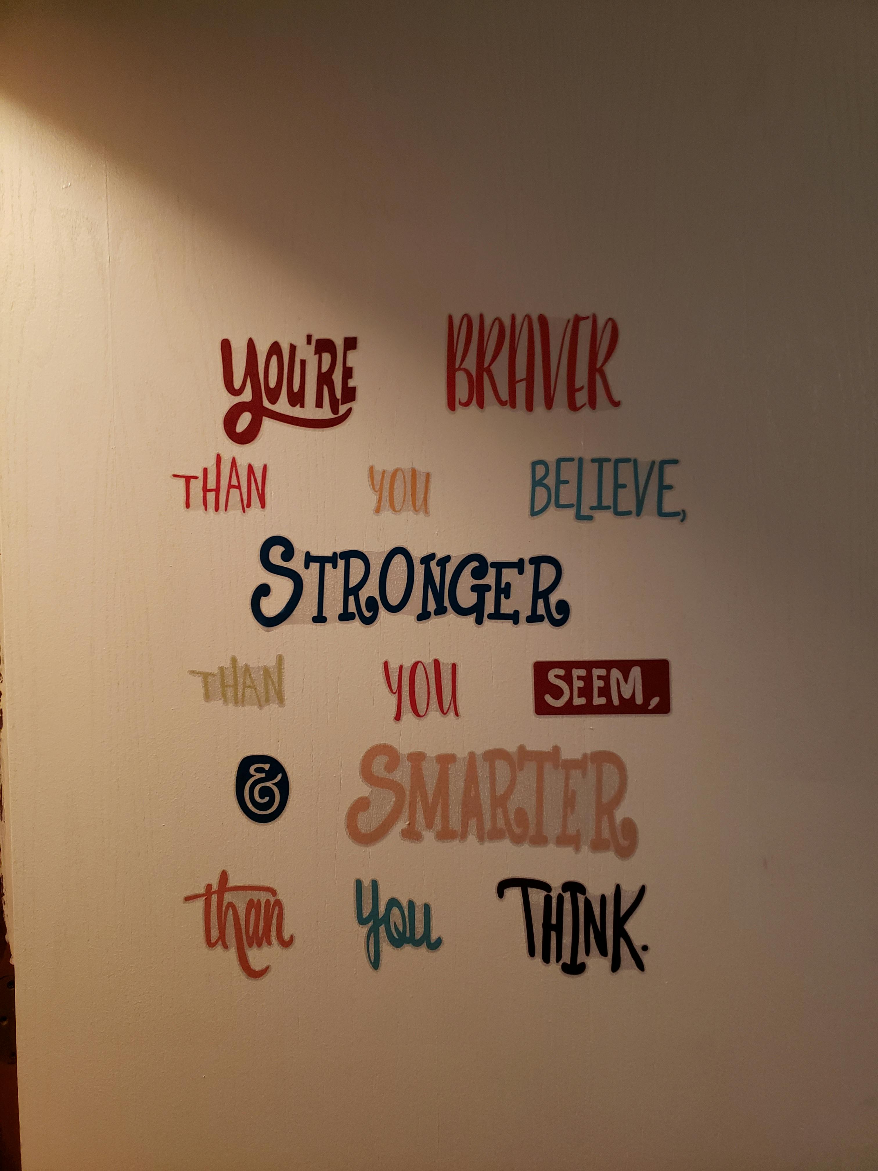 Wall decal with text "You're braver than you believe, stronger than you seem, and smarter than you think"