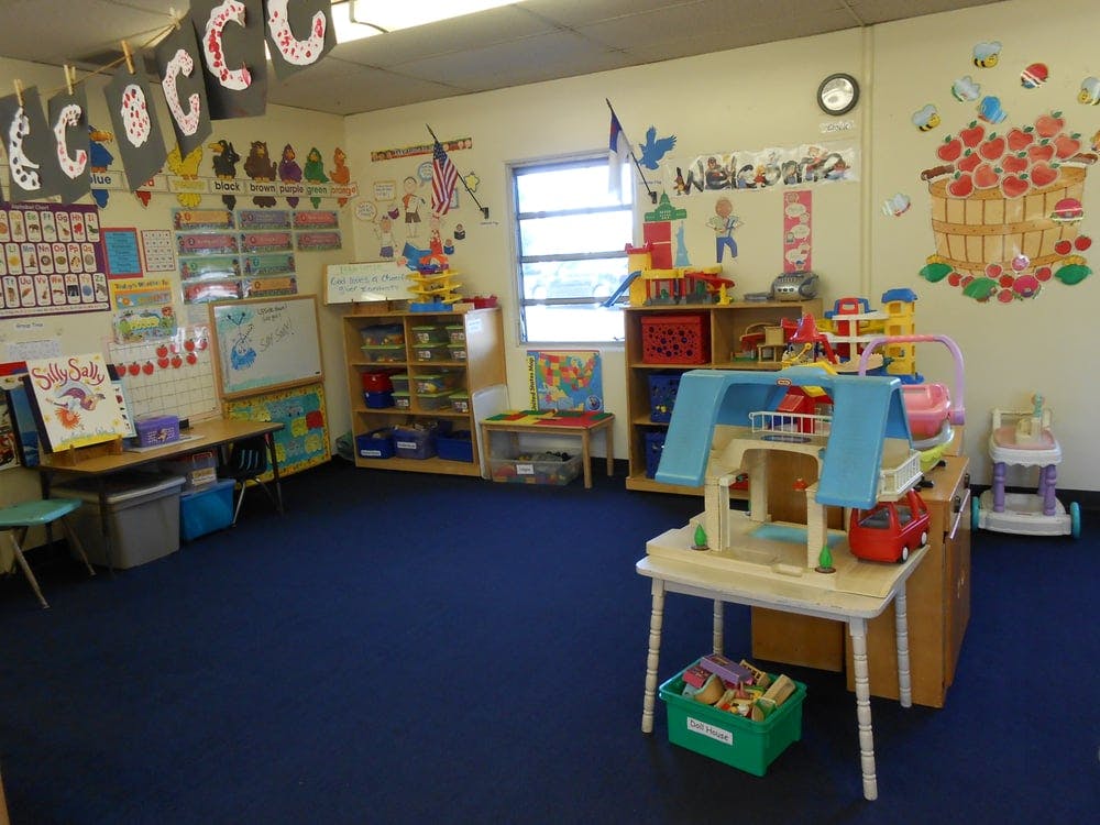 Preschool classroom with toys, learning materials, and decorations