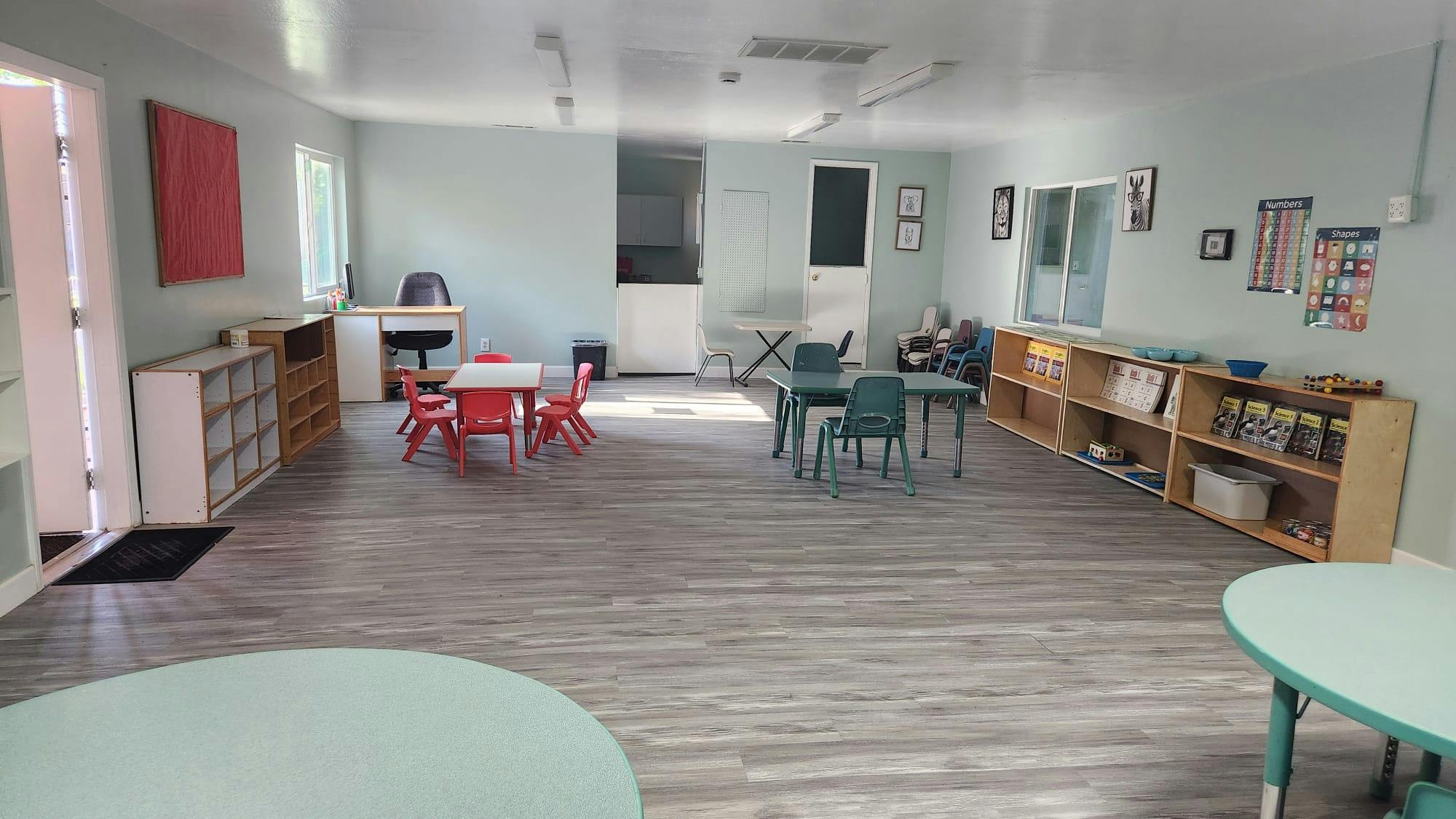 Classroom with small tables and chairs