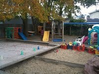 Outdoor playground with sandboxes and play structures