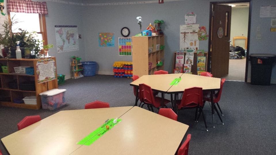 Classroom with small tables and chairs