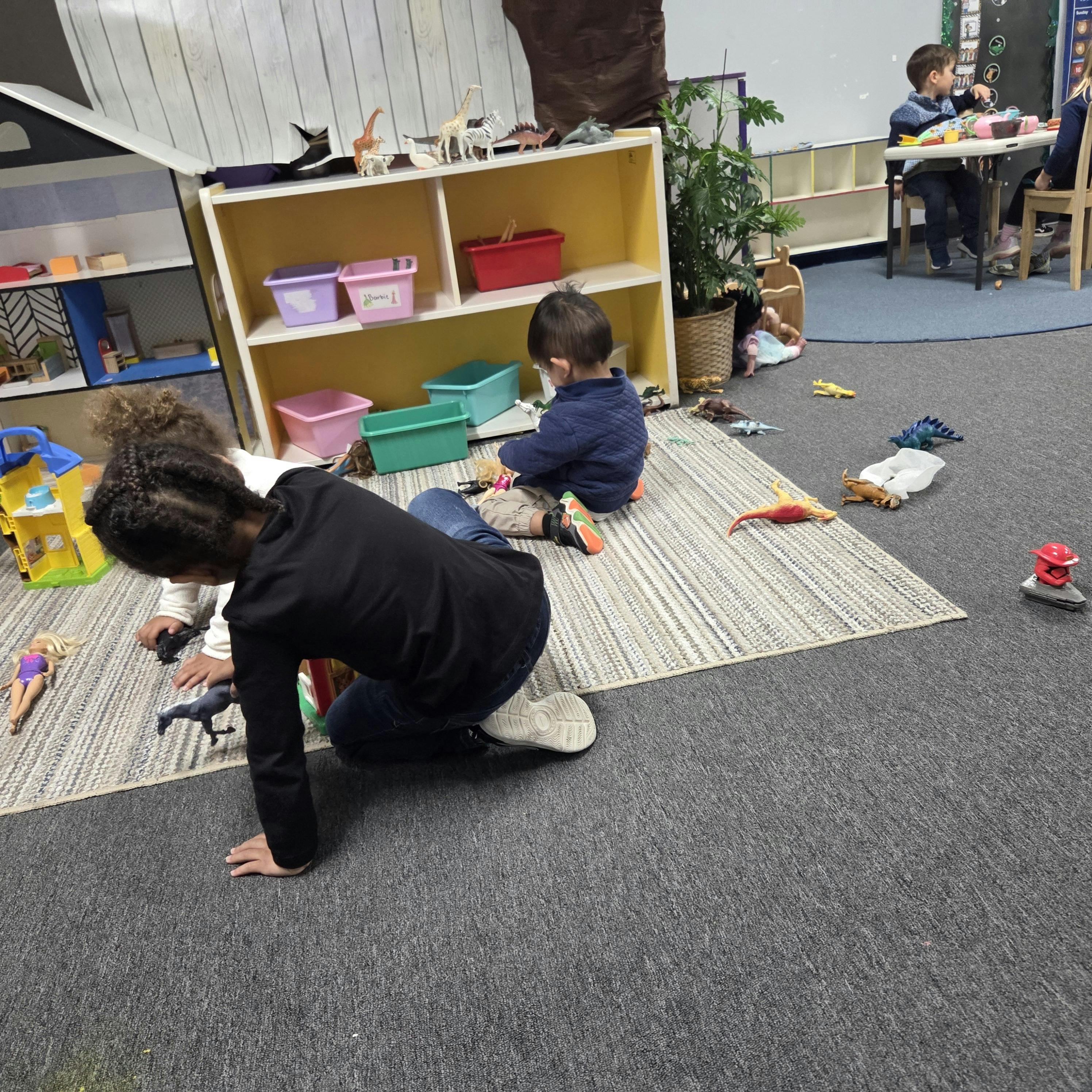 children playing with toys in a classroom