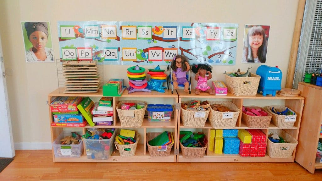 Shelves with toys and learning materials in a classroom
