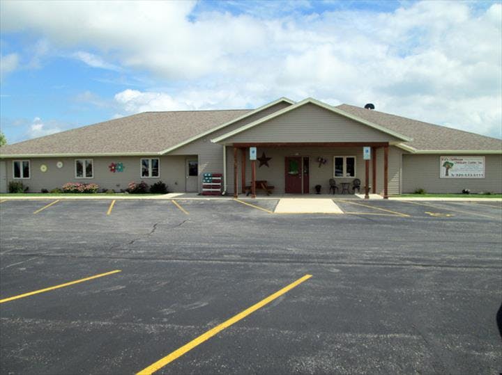 Building with a parking lot in front